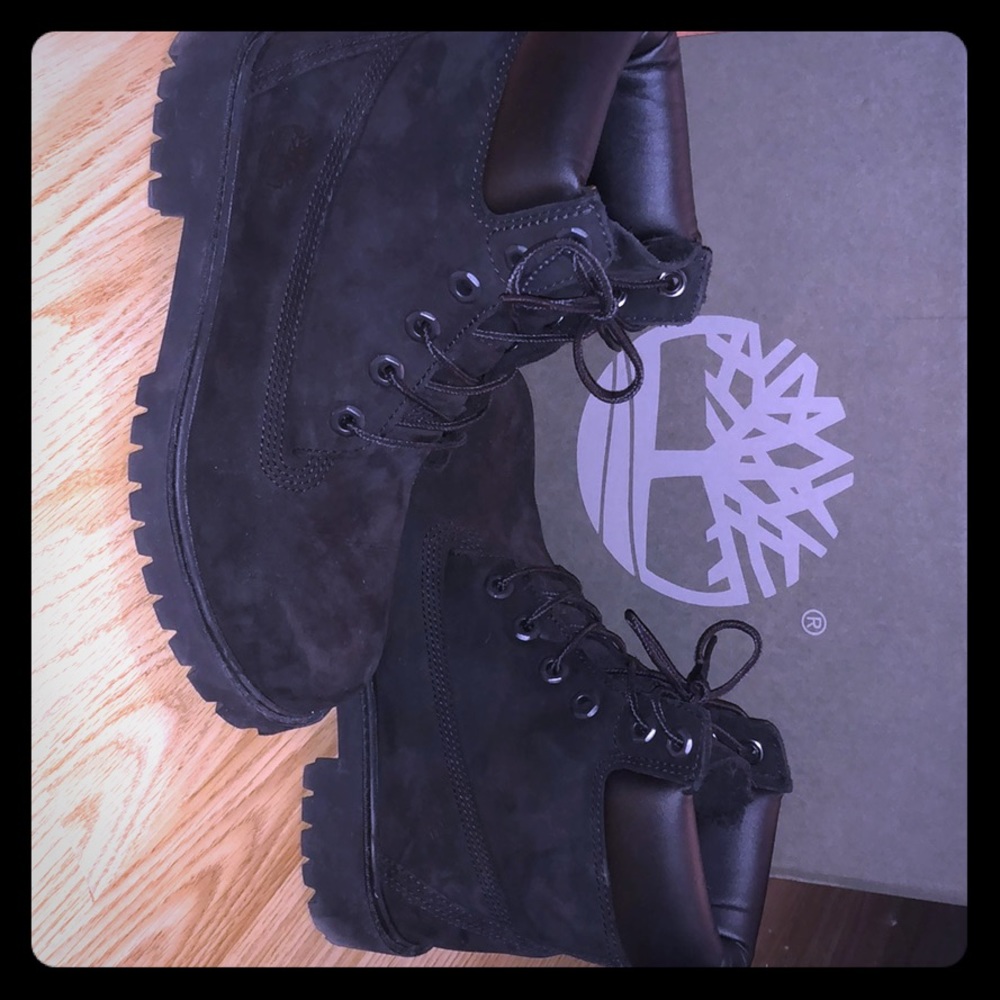 Black pair of  timberlands boots